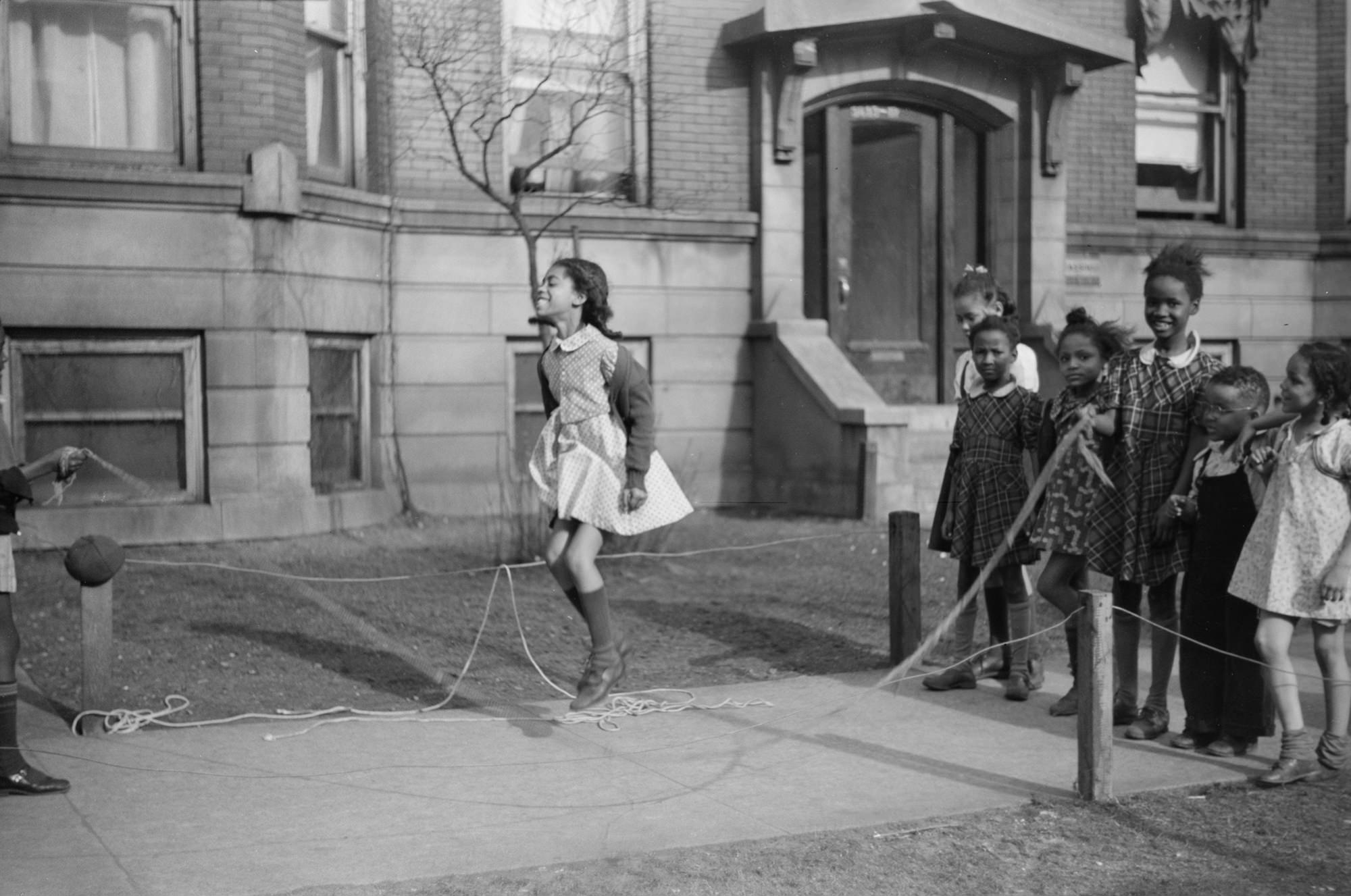Old image of african american girl jumping rope